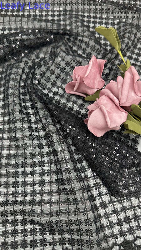 Black Sequin Embroidered Mesh Ground Opulent And Bold Fabric For Eye-Catching Evening And Gala Dresses