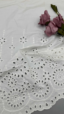 Witte 100% katoen laser uit bloemen geborduurde katoenen stof door de tuin voor mode vrouwen jurk