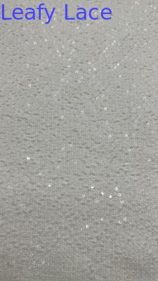 Lappenstift geborduurd kantstof trouwfeeststof luxe elegante stof